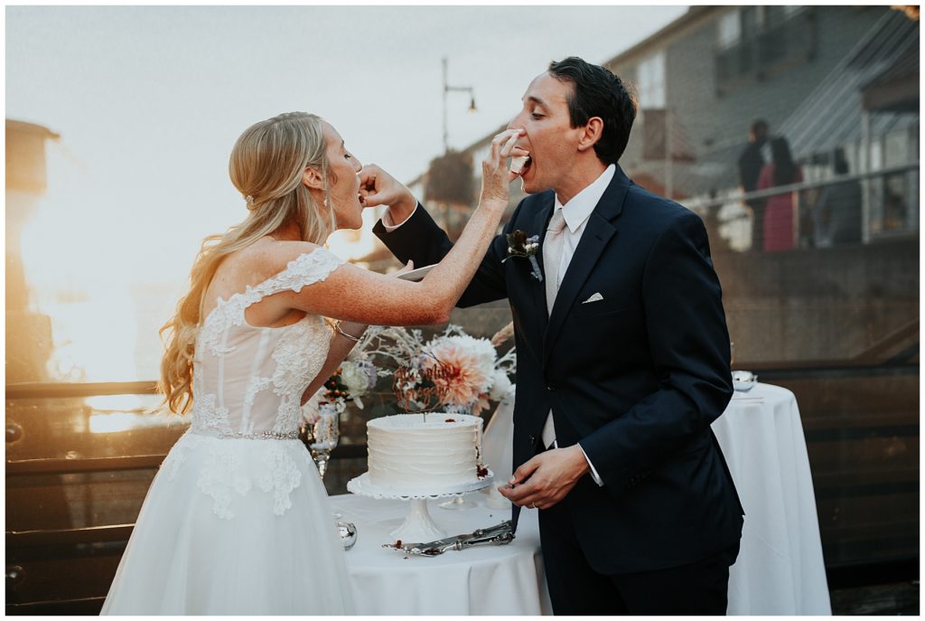 Skansonia waterfront wedding couple eating cake