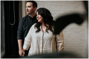couple staring out window