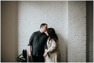 couple kiss on forhead