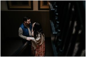 Couple laughing in a stairwell