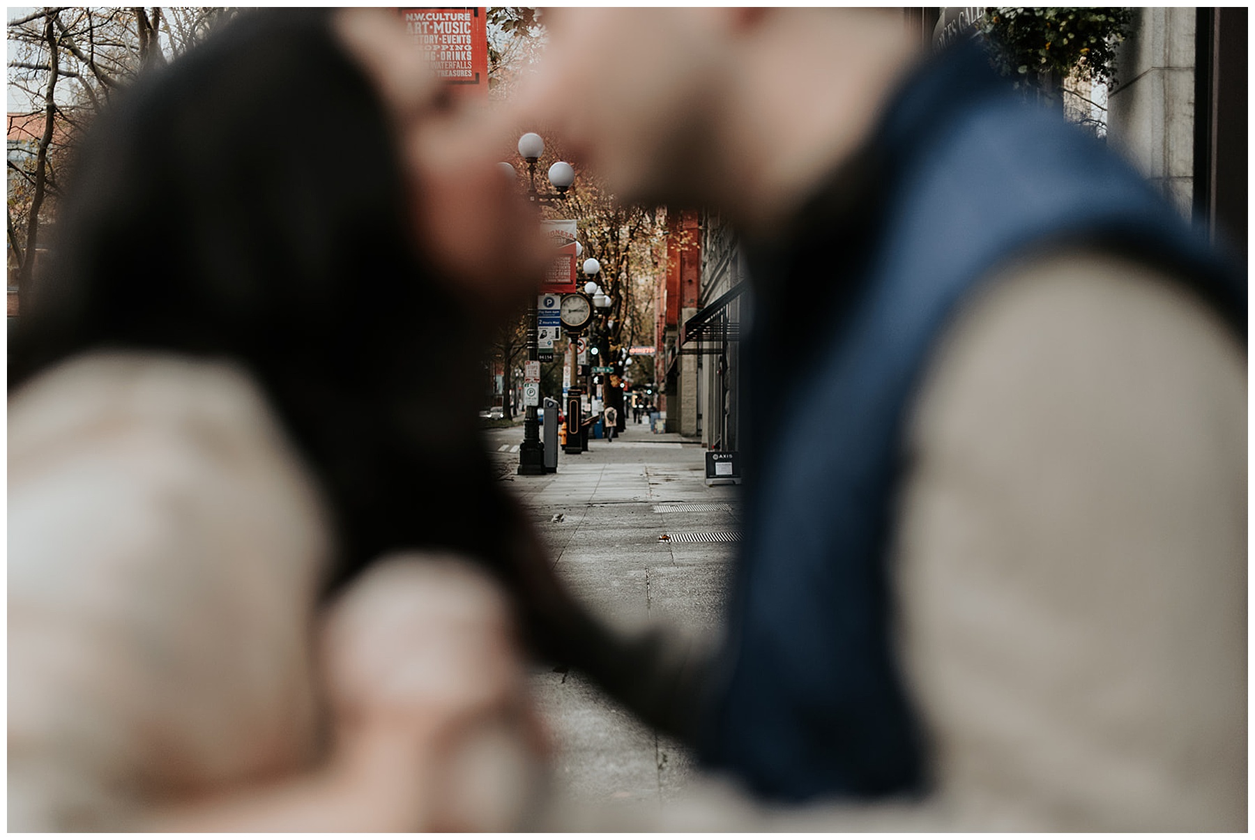 couple kissing focus on background