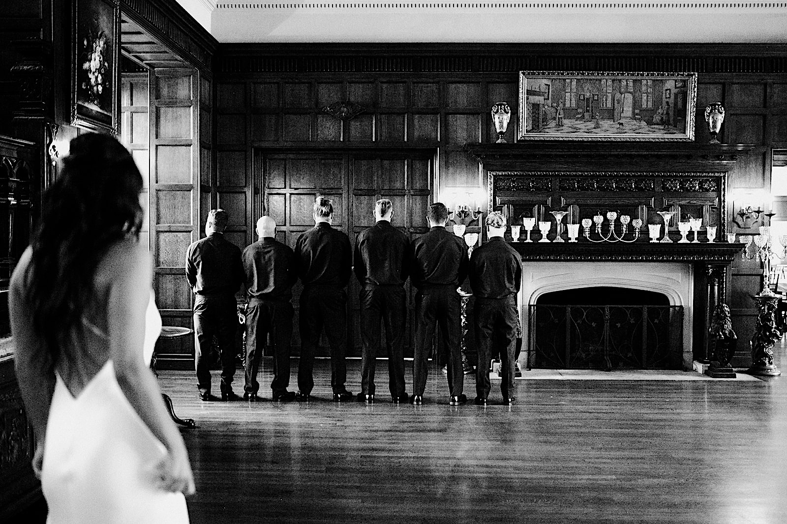 Summer wedding at Thornewood Castle: bride has a first look with groomsmen