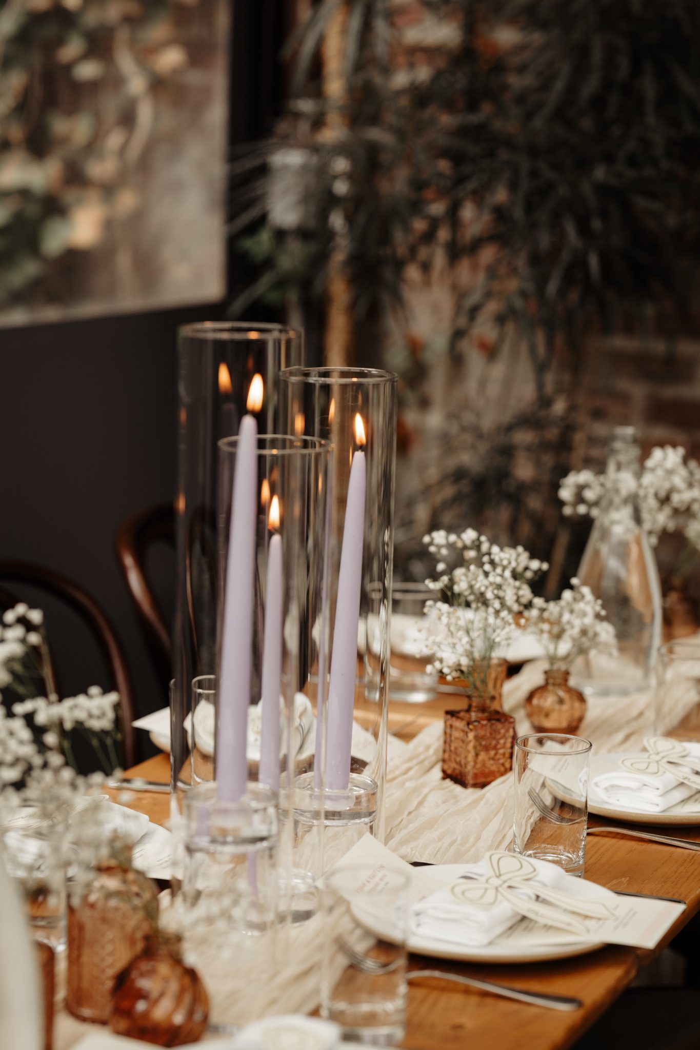 Candlelit reception table with taper candles at Aurora Brooklyn in Williamsburg | New York wedding photographer Tonie Christine