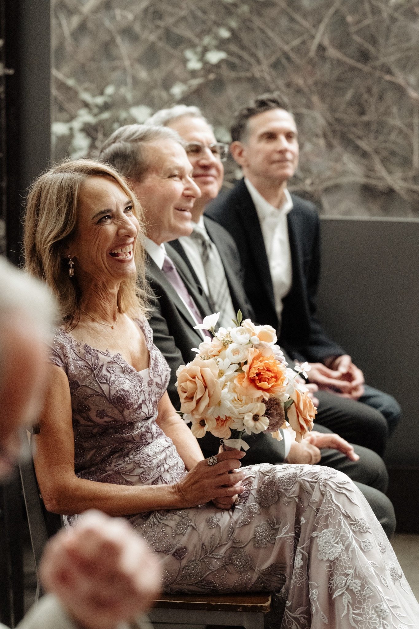 Guests watching the wedding ceremony at Aurora Brooklyn in Williamsburg, NYC | New York wedding photographer Tonie Christine