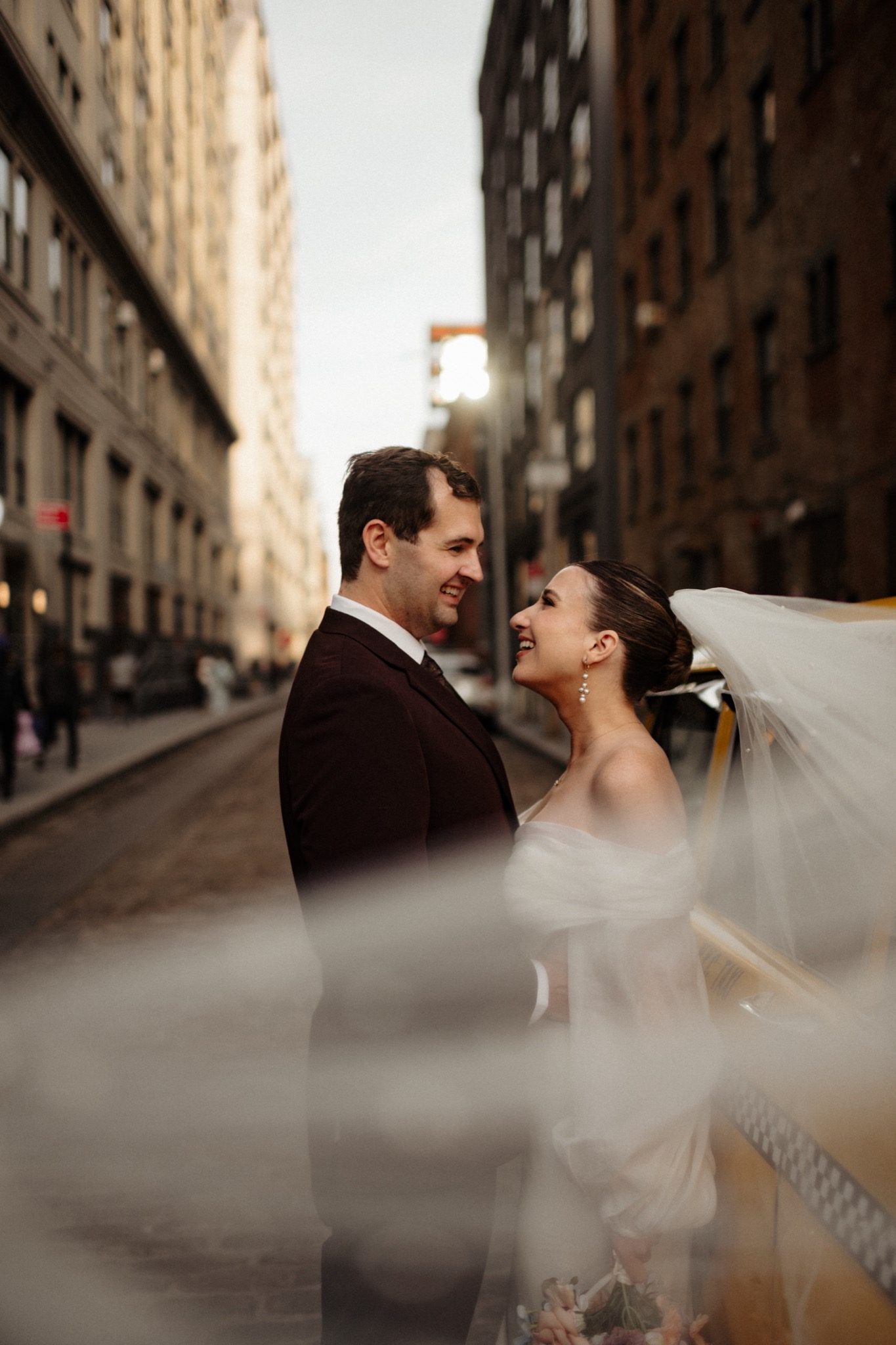 Bride and groom portrait on a Brooklyn street in late afternoon light, NYC | New York wedding photographer Tonie Christine